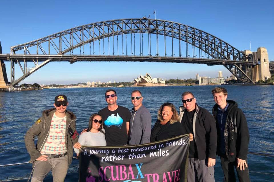 Scuba divers on an SXT Adventures group trip